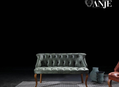 Zelený dvojitý Chesterfield gauč