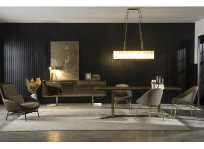 Stôl z sivej tkaniny so zlatými nohami