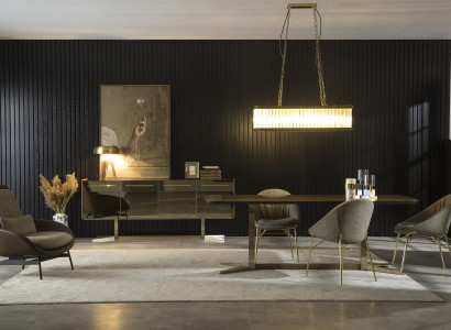 Stôl z sivej tkaniny so zlatými nohami