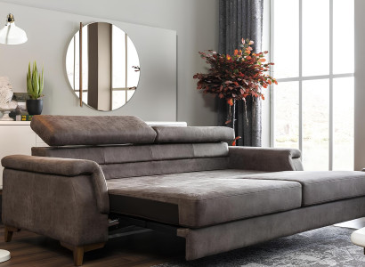 Sivý gauč s tromi miestami a funkciou postele