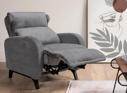 Siv kavčarski stol s luksuznim naslonjalom za noge