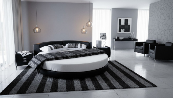 Moderná čierna posteľ s elegantnými detailmi a lavicou